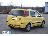 Second-hand Suzuki Ignis 92 CP (67 kW) 2004 Galben Hatchback