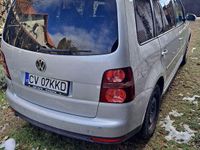 Second-hand VW Touran 107 CP (78 kW) 2009 Gri Monovolum