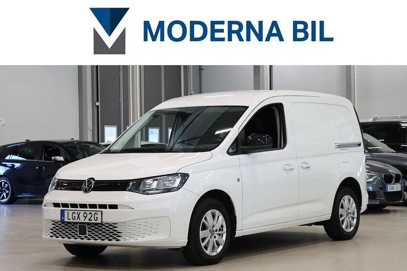 Vit Begagnad 2021 VW Caddy Minibuss | 199 700 kr (Marknadspris) - Bild 1/4