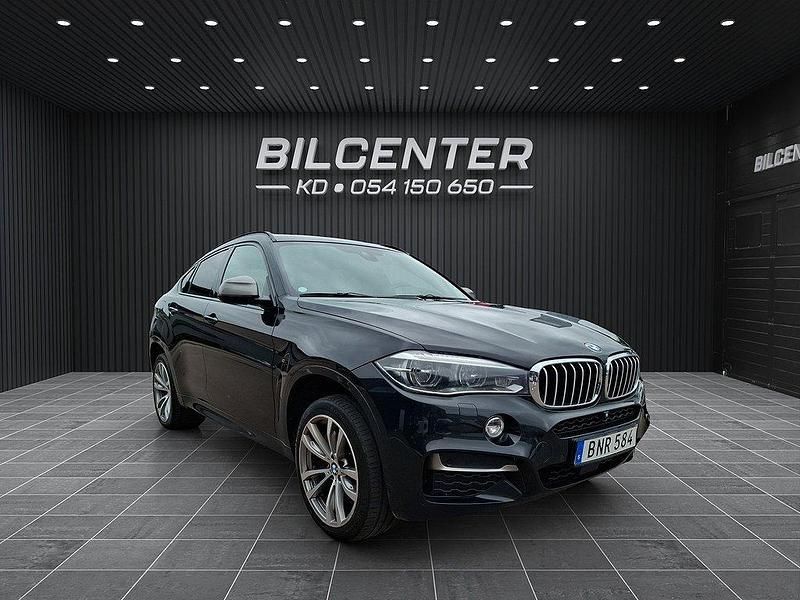 Svart Begagnad 2015 BMW X6 M50 M Sport SUV | 399 900 kr (Marknadspris) - Bild 1/4