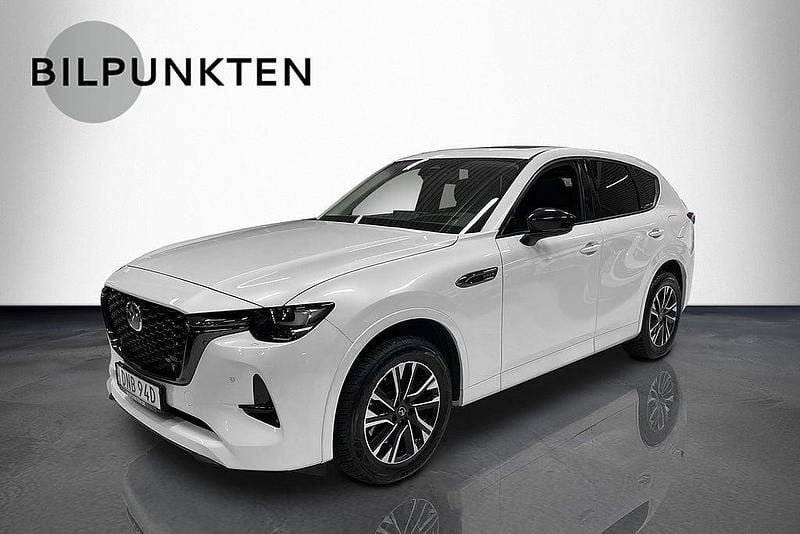 Rhodium white metallic Begagnad 2022 Mazda CX-60 Homura-Line SUV | 394 900 kr (Marknadspris) - Bild 1/4