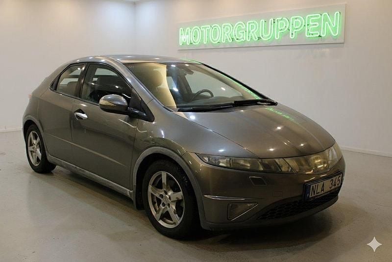 Mörkgrå (grå) Begagnad 2007 Honda Civic Sport Halvkombi | 69 900 kr (Marknadspris) - Bild 1/4