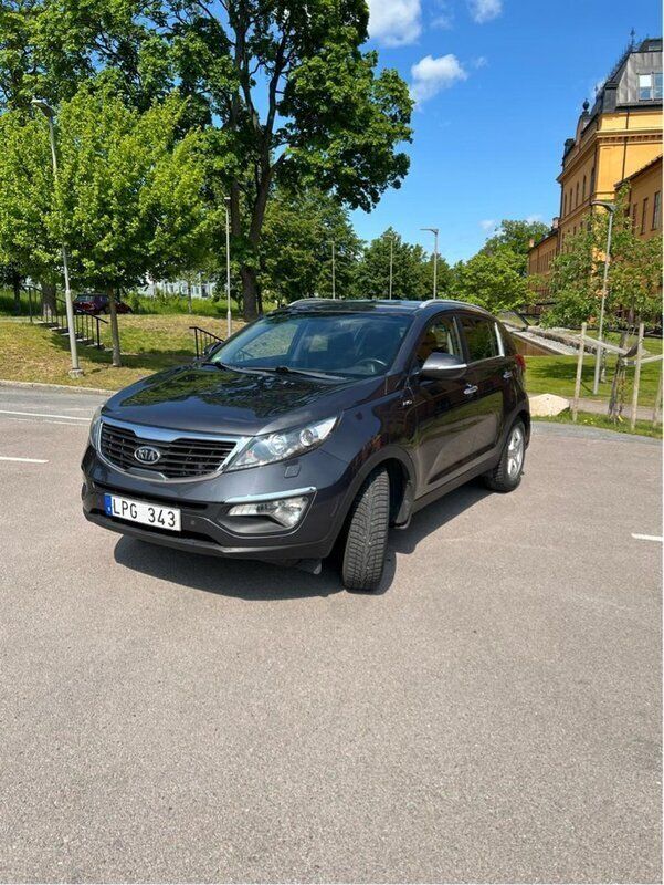 Grå Begagnad 2013 Kia Sportage EX SUV | 109 000 kr (Marknadspris) - Bild 1/4