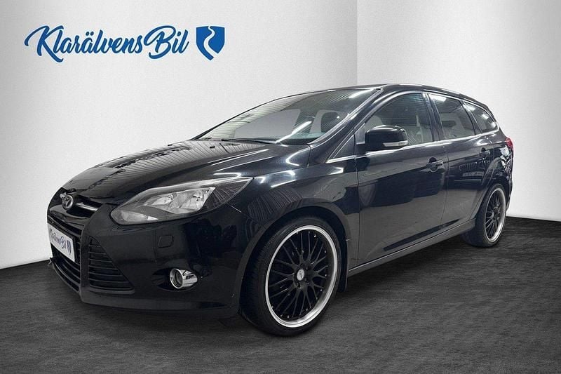 Svart Begagnad 2013 Ford Focus Titanium Kombi | 59 900 kr (Marknadspris) - Bild 1/4