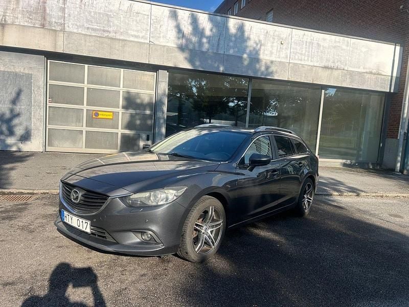 Grå Begagnad 2014 Mazda 6 Kombi | 79 900 kr (Lite dyr) - Bild 1/4