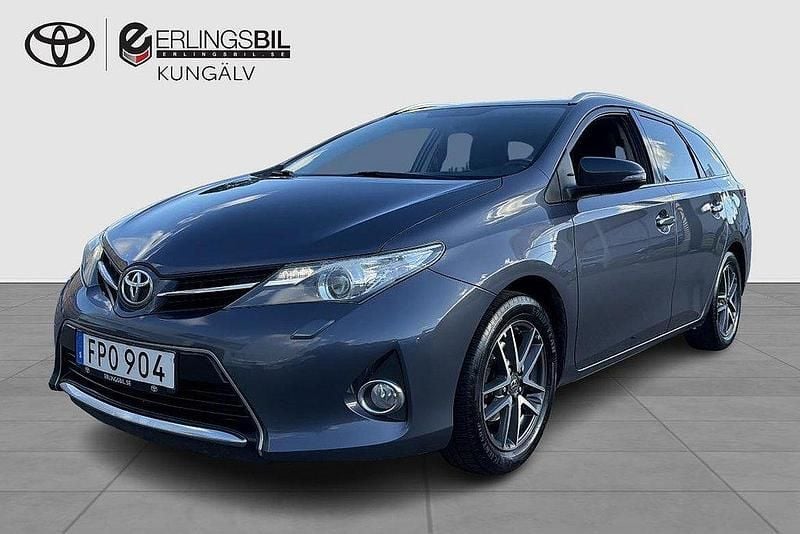 Mörkblå Begagnad 2015 Toyota Auris Touring Sports Kombi | 119 900 kr (Marknadspris) - Bild 1/4