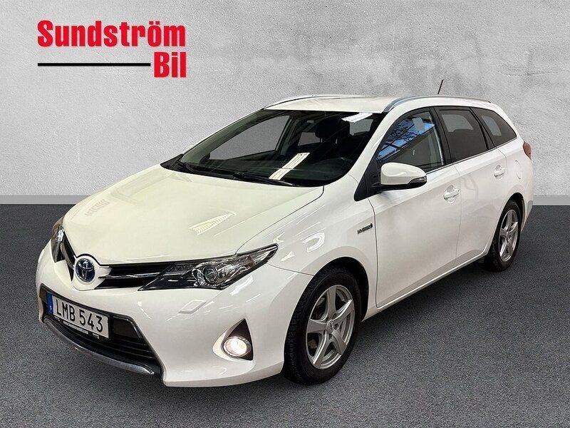 Vit Begagnad 2014 Toyota Auris Hybrid Edition Kombi | 154 900 kr (Marknadspris) - Bild 1/3