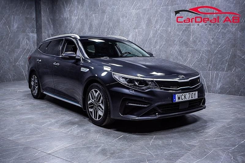 Grå Begagnad 2019 Kia Optima Advance Kombi | 184 800 kr (Marknadspris) - Bild 1/4