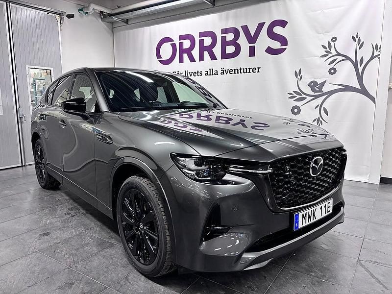 Grå Ny 2025 Mazda CX-60 Homura-Line SUV | 589 700 kr (Marknadspris) - Bild 1/4