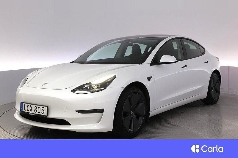 Vit Begagnad 2021 Tesla Model 3 Long Range Sedan | 309 900 kr (Marknadspris) - Bild 1/4