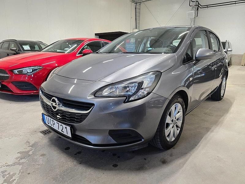 Grå (grå metallic) Begagnad 2016 Opel Corsa Enjoy Halvkombi | 94 500 kr (Lite dyr) - Bild 1/4