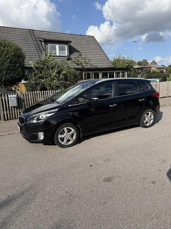 Svart Begagnad 2014 Kia Carens Minibuss | 99 000 kr (Marknadspris) - Bild 1/4