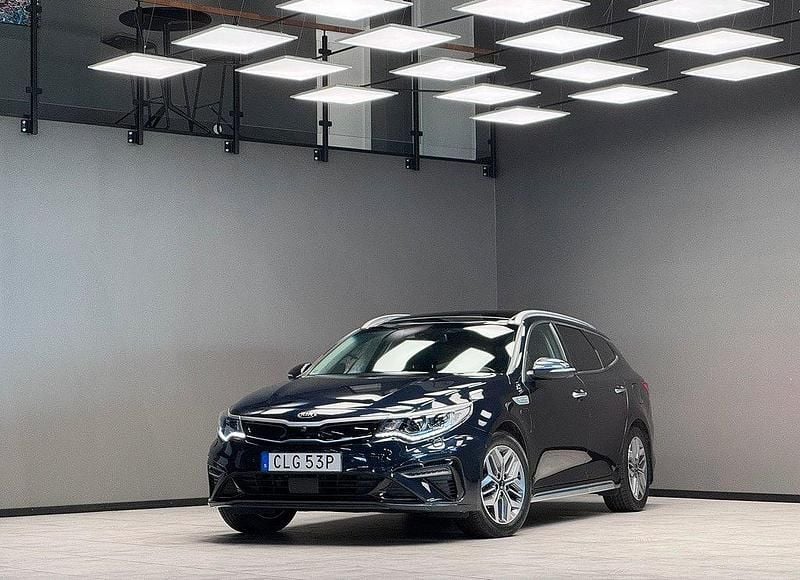 Blå Begagnad 2019 Kia Optima Hybrid 3 Sedan | 239 900 kr (Lite dyr) - Bild 1/3