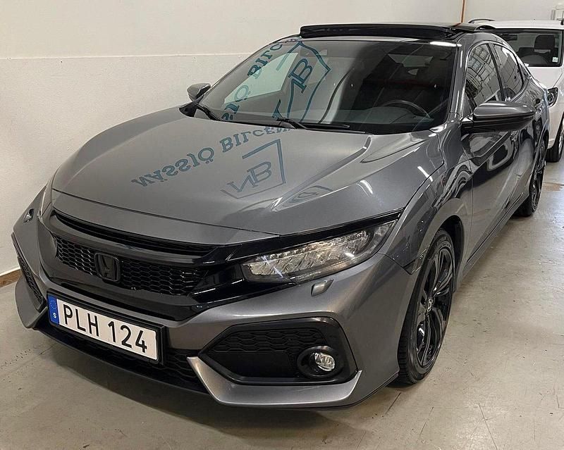 Mörkgrå Begagnad 2017 Honda Civic Executive Halvkombi | 147 000 kr (Marknadspris) - Bild 1/4