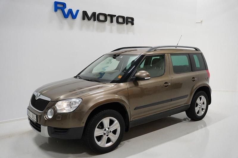 Mörkbrun Begagnad 2010 Skoda Yeti Experience SUV | 99 800 kr (Marknadspris) - Bild 1/4