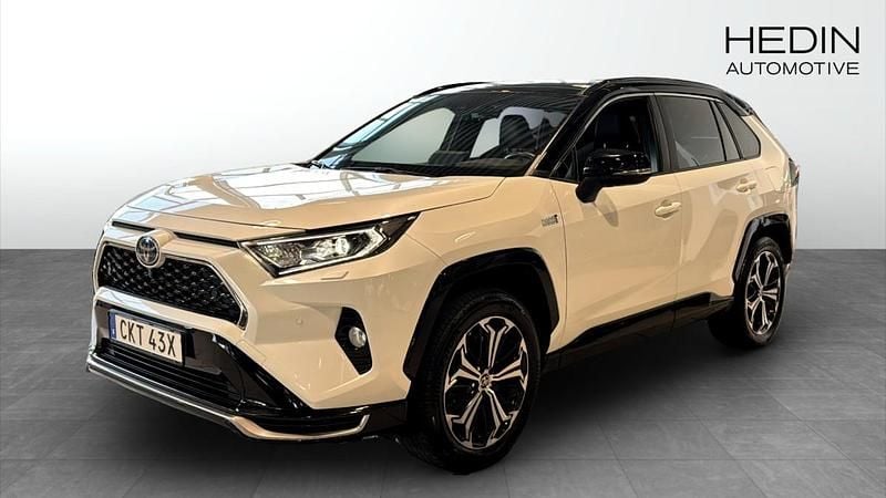 Vit (white) Begagnad 2021 Toyota RAV4 Hybrid Premium SUV | 389 900 kr (Bra pris) - Bild 1/4