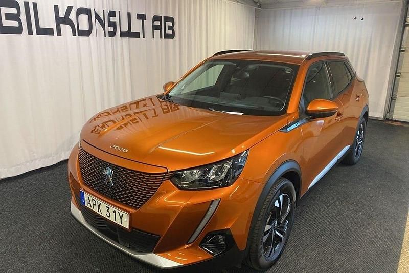 Orange Begagnad 2021 Peugeot e-2008 Allure SUV | 185 000 kr (Marknadspris) - Bild 1/4