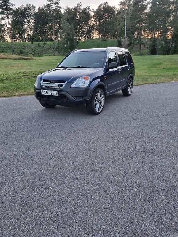 Blå Begagnad 2003 Honda CR-V SUV | 39 000 kr (Dyr) - Bild 1/4