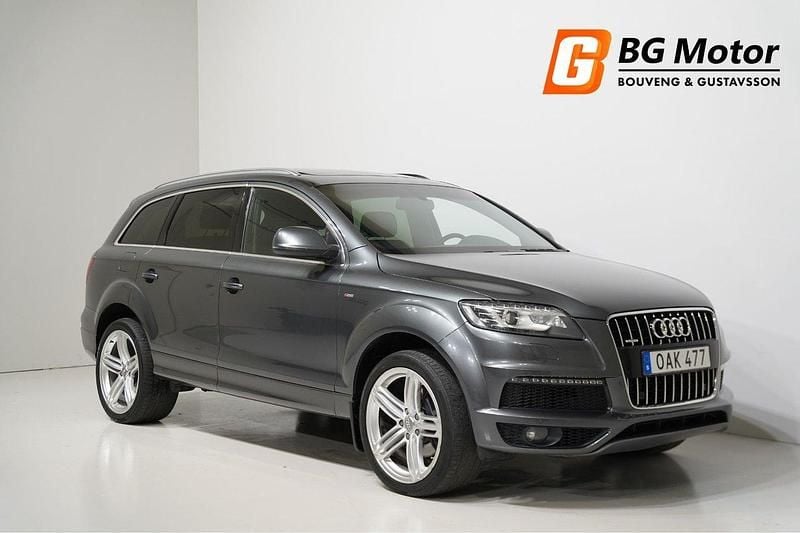 Grå Begagnad 2013 Audi Q7 S-Line SUV | 219 800 kr (Lite dyr) - Bild 1/4