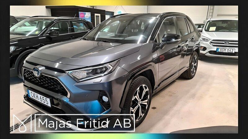 Grå Begagnad 2021 Toyota RAV4 Hybrid Premium SUV | 419 500 kr (Marknadspris) - Bild 1/4