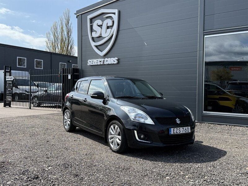 Svart Begagnad 2015 Suzuki Swift Halvkombi | 72 900 kr (Marknadspris) - Bild 1/4