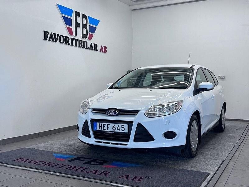 Vit Begagnad 2014 Ford Focus Trend Kombi | 69 900 kr (Marknadspris) - Bild 1/4