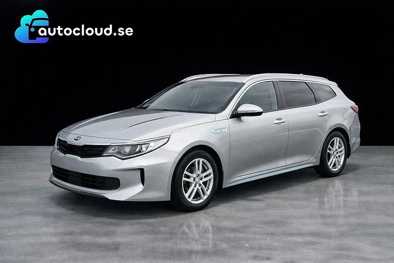 Grå Begagnad 2018 Kia Optima Hybrid Sport Sedan | 169 800 kr (Marknadspris) - Bild 1/2