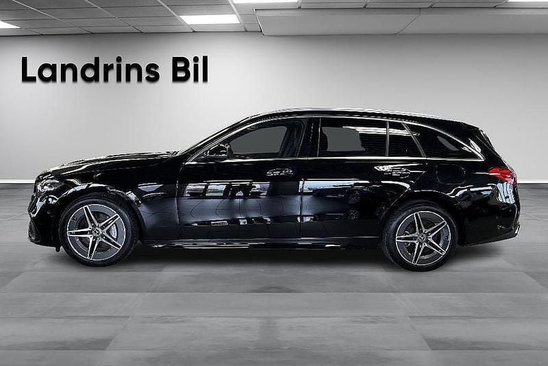 Begagnad Mercedes C300e AMG line 313 HK (230 kW) 2022 Svart Kombi