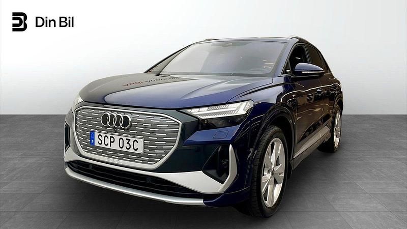 Navarrablå metallic Begagnad 2024 Audi Q4 e-tron S-Line SUV | 589 000 kr (Marknadspris) - Bild 1/4