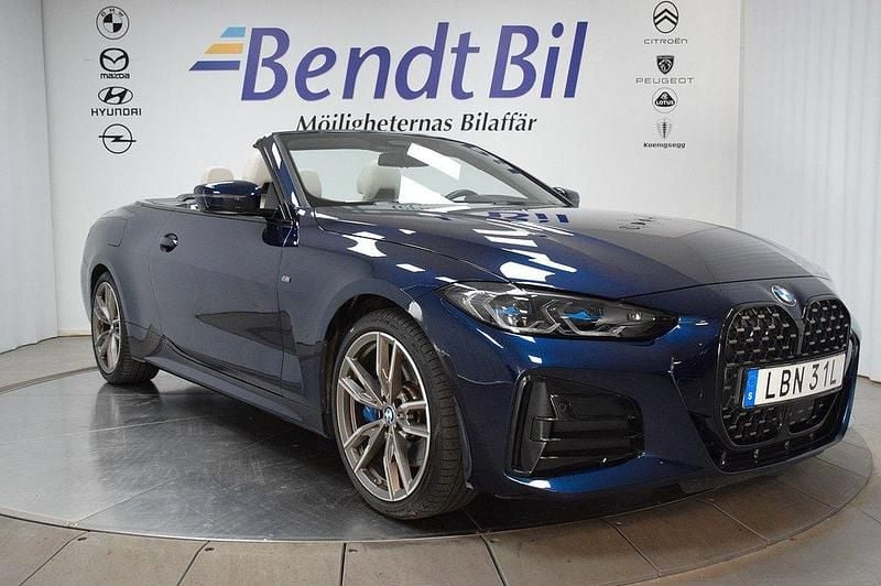 Tanzanite blå met. Begagnad 2022 BMW M440 M Sport Sedan | 699 500 kr - Bild 1/3