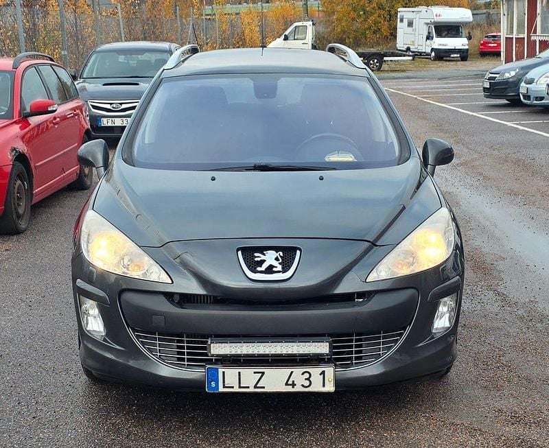 Mörkgrå (grå) Begagnad 2009 Peugeot 308 Kombi | 19 900 kr (Bra pris) - Bild 1/4