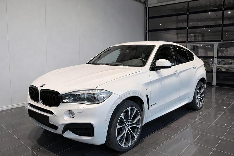 Begagnad BMW X6 M Sport 313 HK (230 kW) 2019 Pärlvit met/mineral vit met. SUV