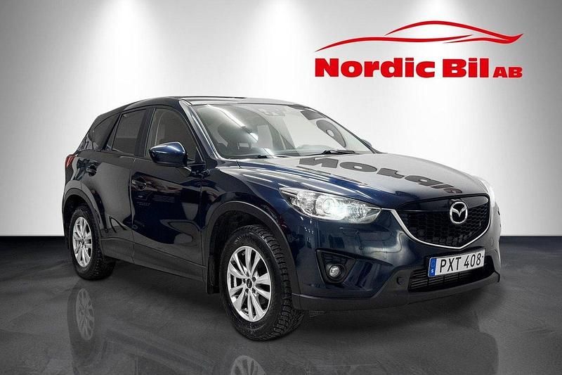 Blå Begagnad 2015 Mazda CX-5 SUV | 99 900 kr (Marknadspris) - Bild 1/4