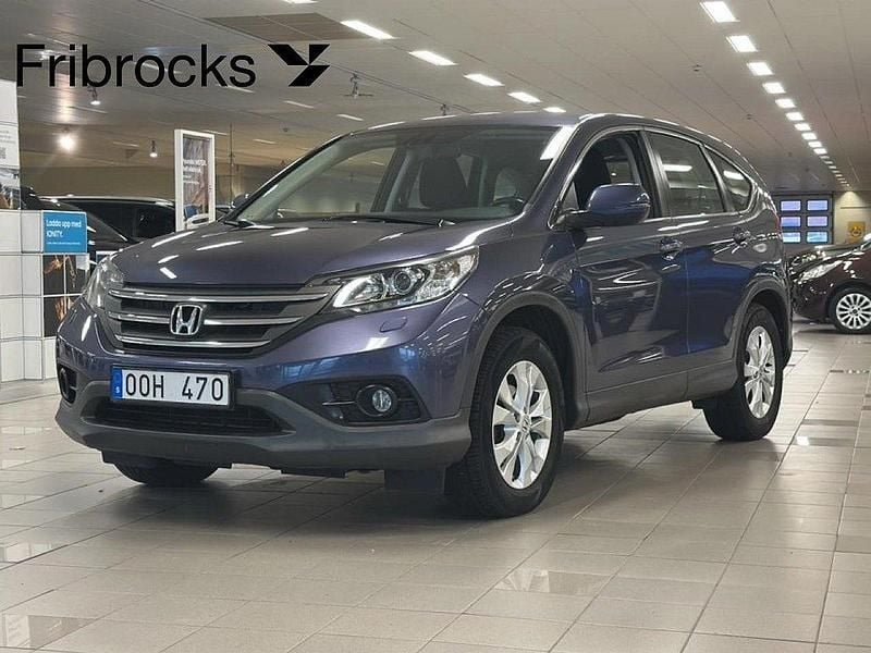 Blå Begagnad 2014 Honda CR-V SUV | 139 800 kr (Marknadspris) - Bild 1/4