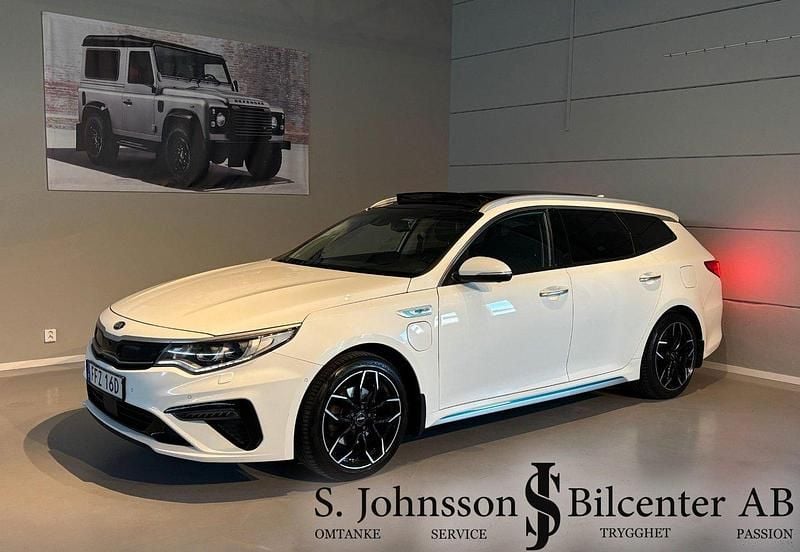 Vit Begagnad 2019 Kia Optima Hybrid 3 Sedan | 179 900 kr (Marknadspris) - Bild 1/4