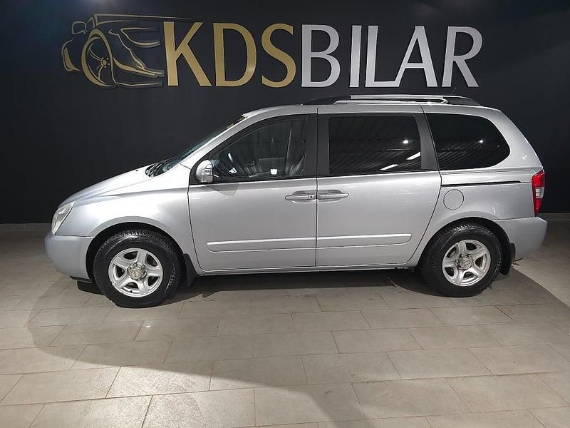 Silver Begagnad 2011 Kia Carnival Minibuss | 85 000 kr - Bild 1/4