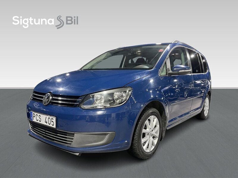 Blå Begagnad 2012 VW Touran Minibuss | 79 900 kr (Marknadspris) - Bild 1/3
