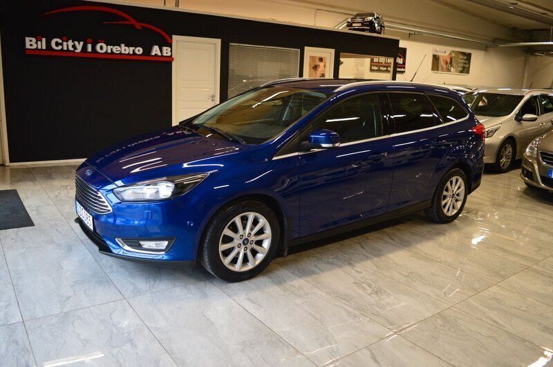 Blå Begagnad 2014 Ford Focus Titanium Kombi | 89 900 kr (Lite dyr) - Bild 1/4