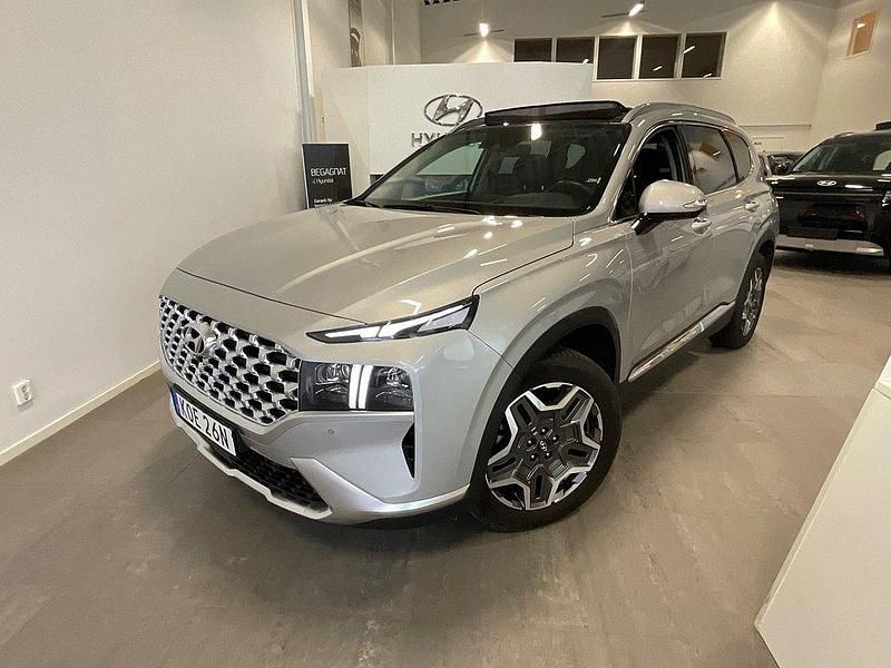 Silvermetallic Begagnad 2023 Hyundai Santa Fe Advanced SUV | 479 500 kr (Marknadspris) - Bild 1/4