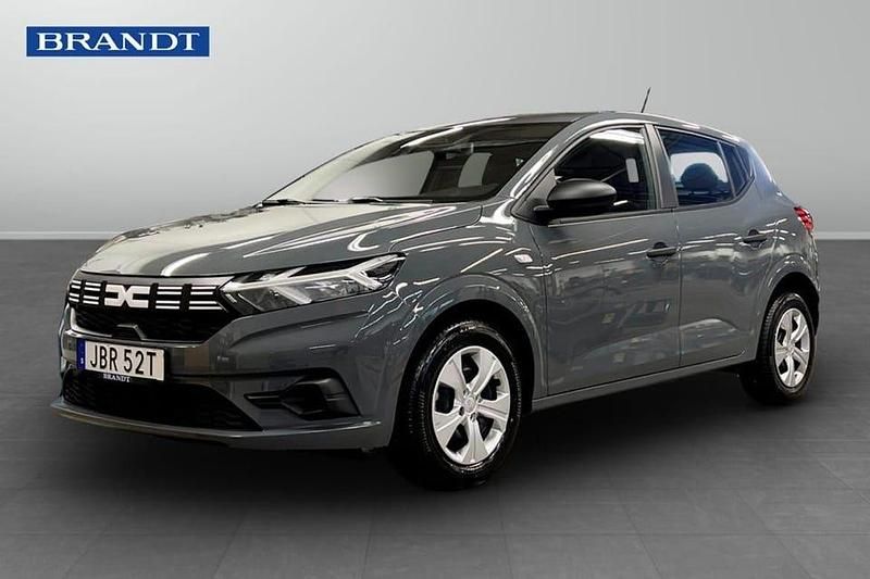 Grå Ny 2025 Dacia Sandero Essentiel Halvkombi | 174 900 kr (Marknadspris) - Bild 1/4