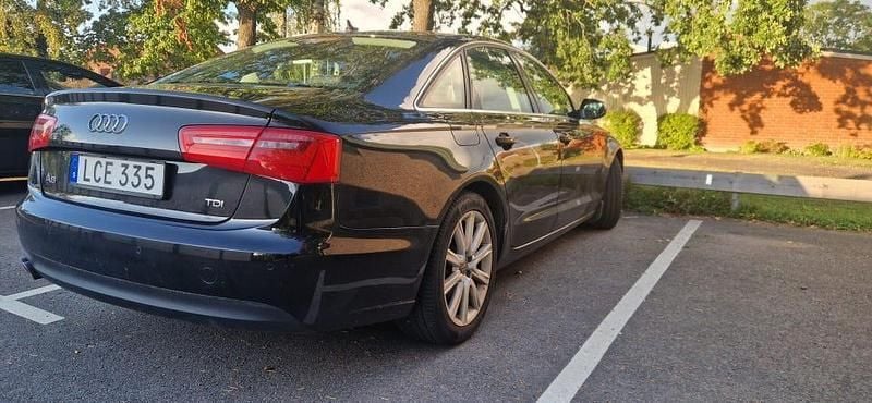 Pärlemosvartmetallic Begagnad 2014 Audi A6 Sedan | 137 000 kr (Marknadspris) - Bild 1/4