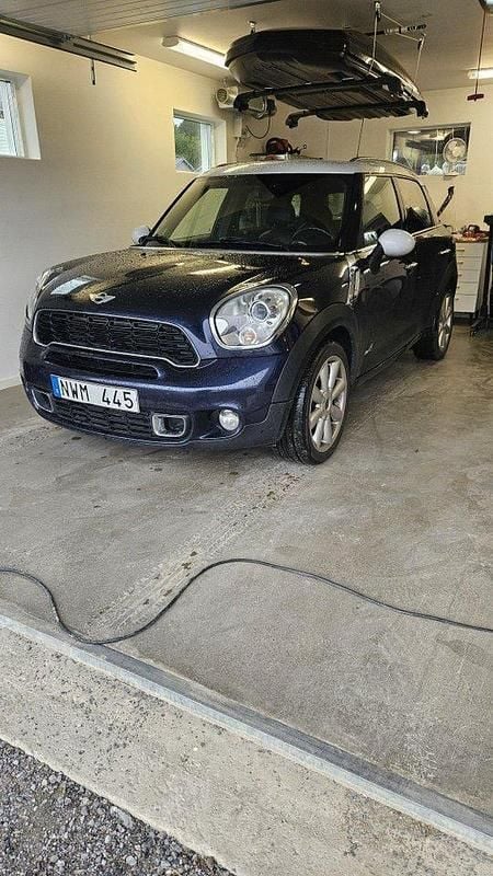 Blå Begagnad 2014 Mini Cooper S Countryman SUV | 100 000 kr (Marknadspris) - Bild 1/4