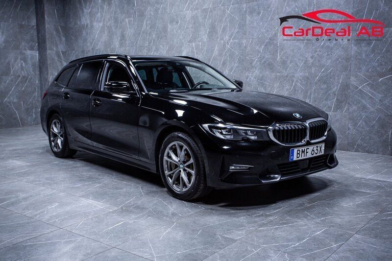 Svart Begagnad 2021 BMW 330e Sport Line Kombi | 238 800 kr (Superpris) - Bild 1/4