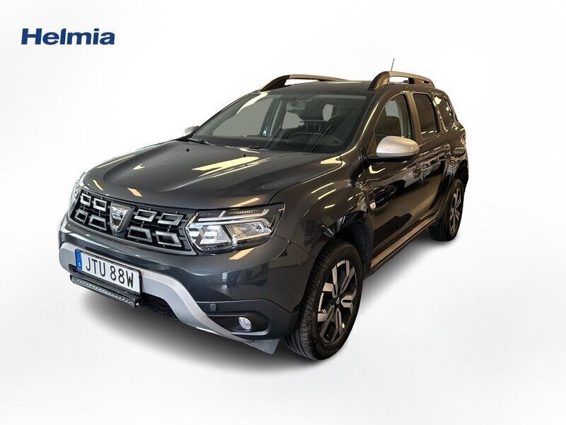 Mörkgrå (grå) Begagnad 2022 Dacia Duster Prestige SUV | 209 900 kr (Marknadspris) - Bild 1/4