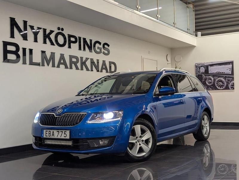 Blå Begagnad 2014 Skoda Octavia Business Line Kombi | 114 900 kr (Marknadspris) - Bild 1/4