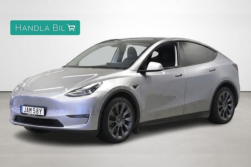 Begagnad Tesla Model Y Long Range AWD 378 kW (514 HK) 2023 Grå SUV