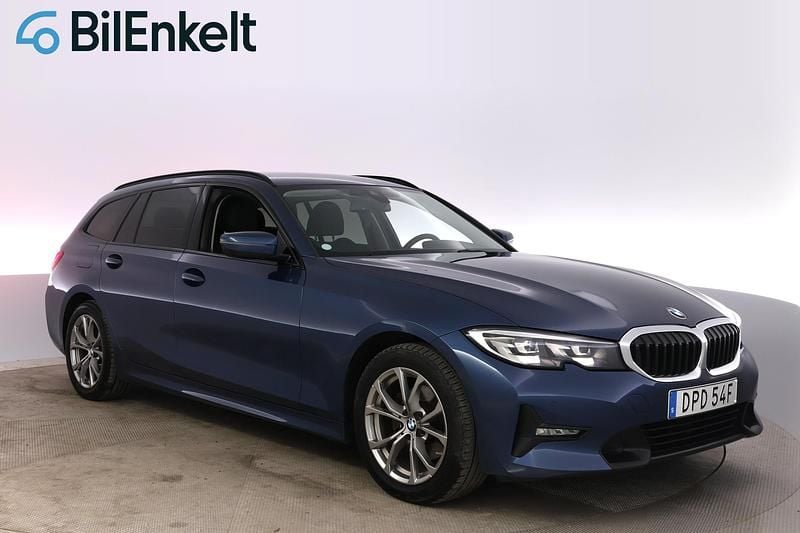 Blå Begagnad 2021 BMW 320 Sport Line Kombi | 264 900 kr (Superpris) - Bild 1/4