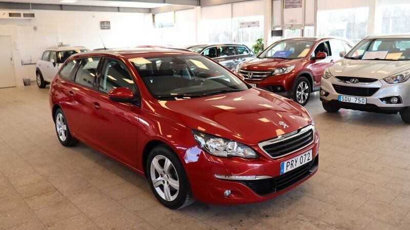 Mörkröd Begagnad 2014 Peugeot 308 Active Kombi | 89 900 kr (Marknadspris) - Bild 1/4