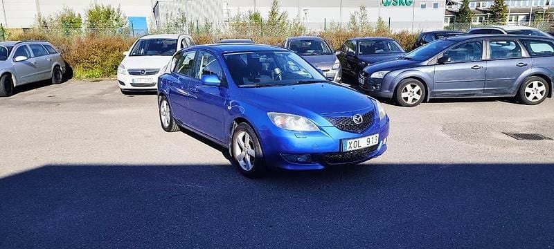 Blå Begagnad 2006 Mazda 3 Inclusive Halvkombi | 44 900 kr (Marknadspris) - Bild 1/4