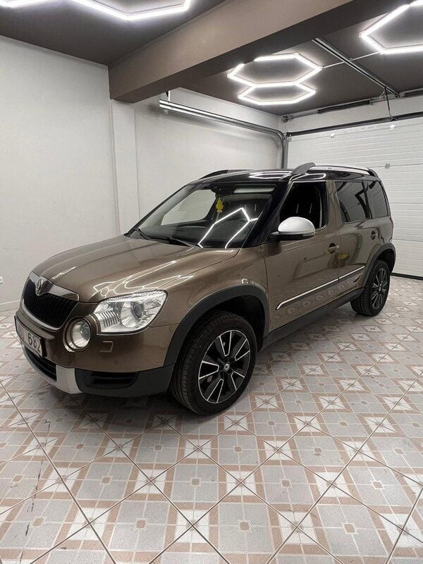 Brun Begagnad 2013 Skoda Yeti Business Line SUV | 69 900 kr (Marknadspris) - Bild 1/4